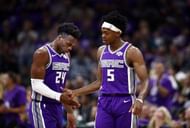 De'Aaron Fox (r) will hold the key for the Kings once again